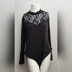 Black body suit with lace shoulders